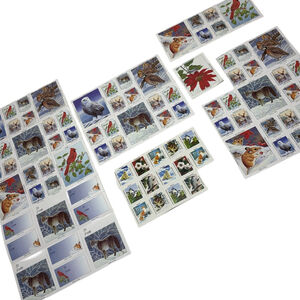 Lot of 40+ vintage Christmas decorative stamps and gift tags